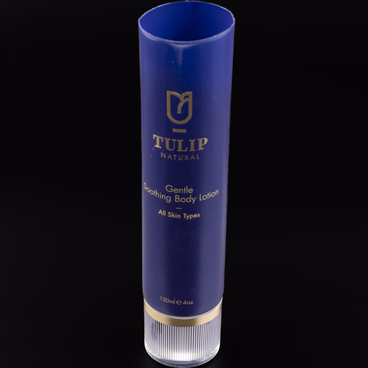 Navy plastic lotion tube with clear cap and gold detail
